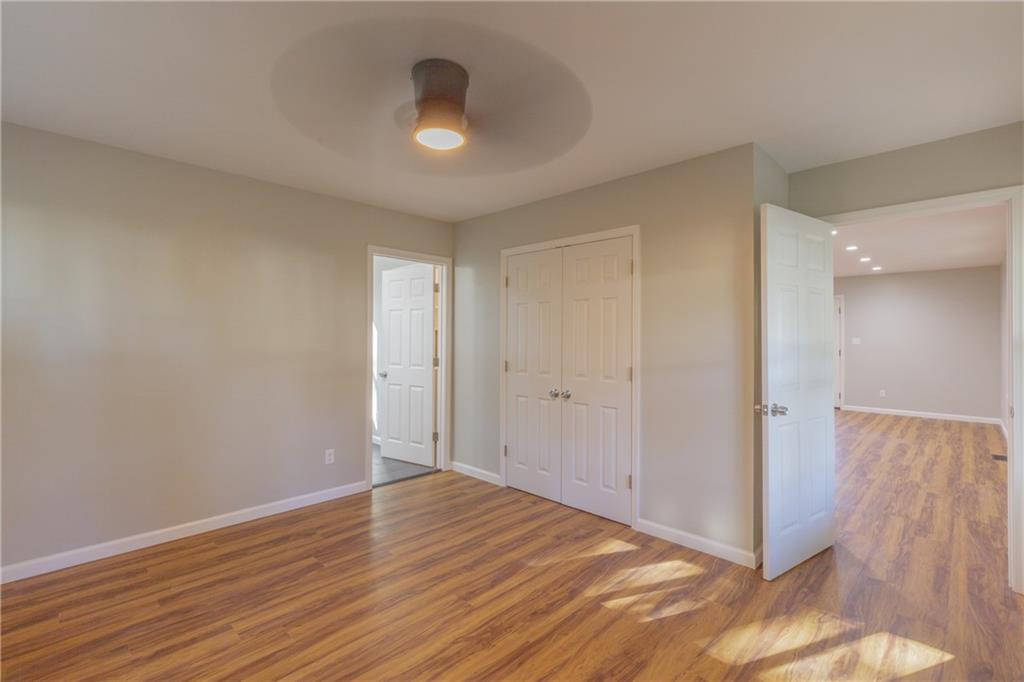 55 Reece Street Menlo, GA 30731 - Photo 15 of 46 a view of an empty room and wooden floor