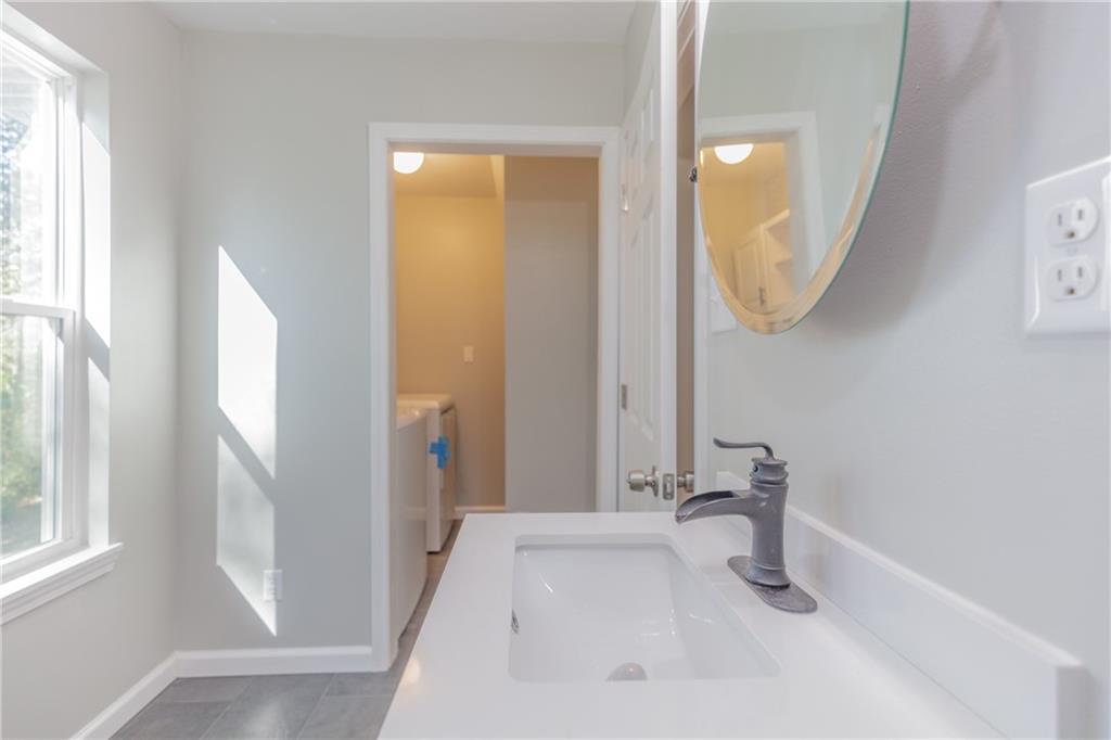 55 Reece Street Menlo, GA 30731 - Photo 20 of 46 a bathroom with a sink and a mirror