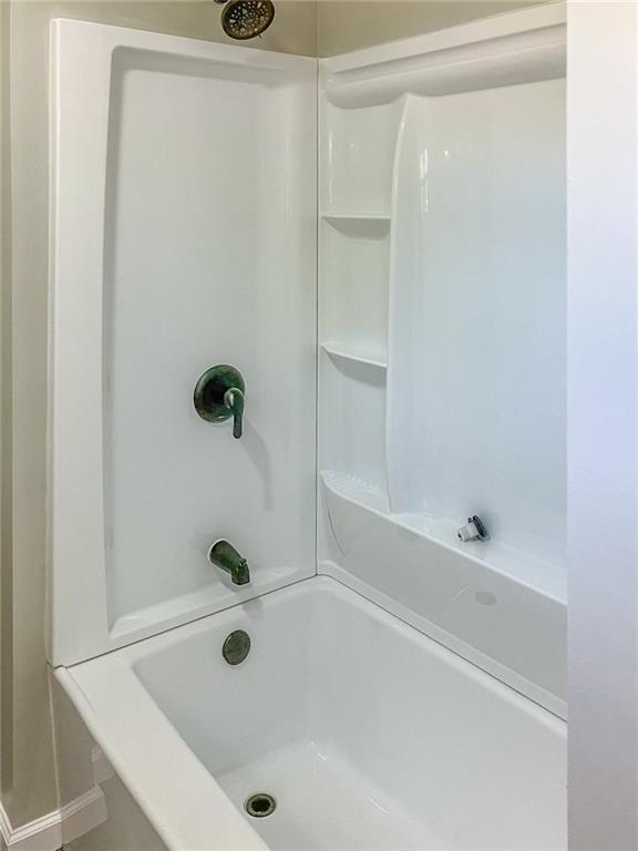 55 Reece Street Menlo, GA 30731 - Photo 27 of 46 a bathroom with a tub