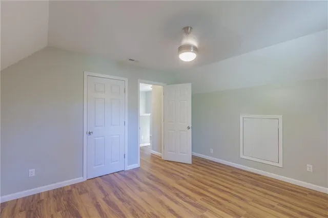 a view of a bathroom with a glass door