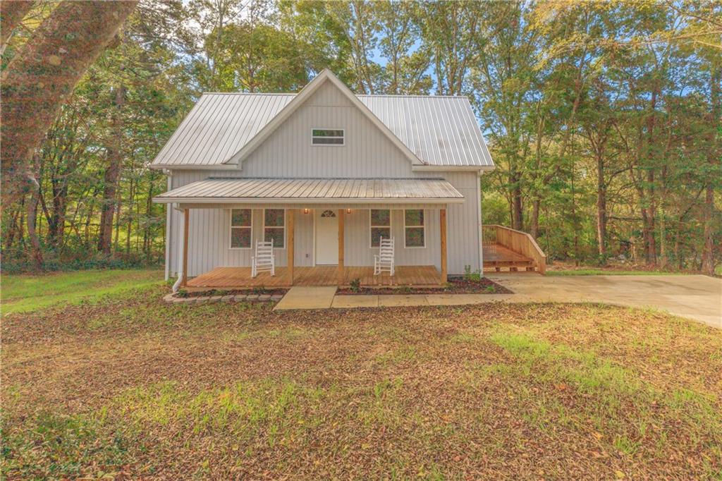 55 Reece Street Menlo, GA 30731 - Photo 42 of 46 a front view of a house with a yard