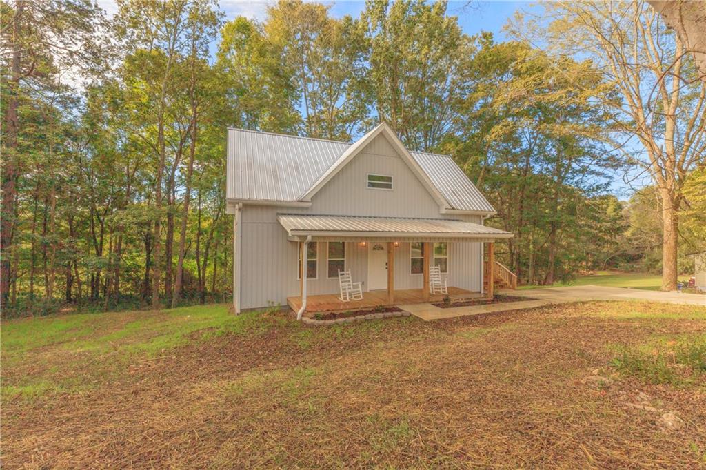 55 Reece Street Menlo, GA 30731 - Photo 43 of 46 a front view of a house with a yard
