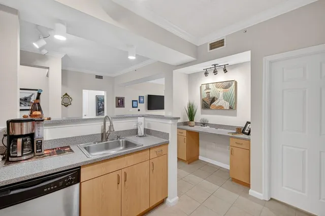 a bathroom with a sink a vanity and mirror