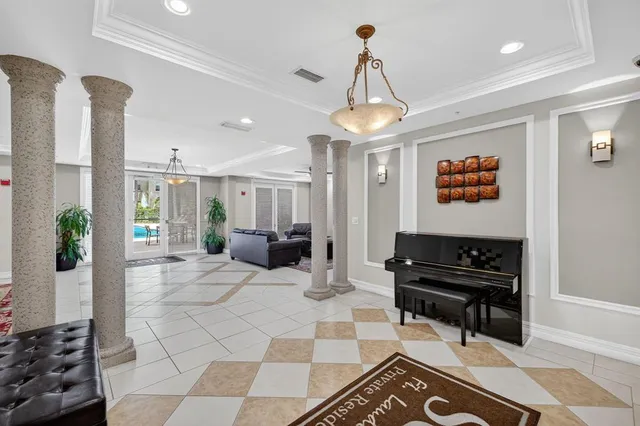 a living room with furniture and a rug