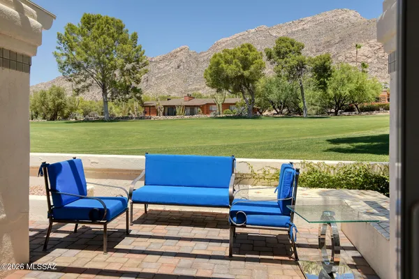 a park bench sitting in the middle of a park