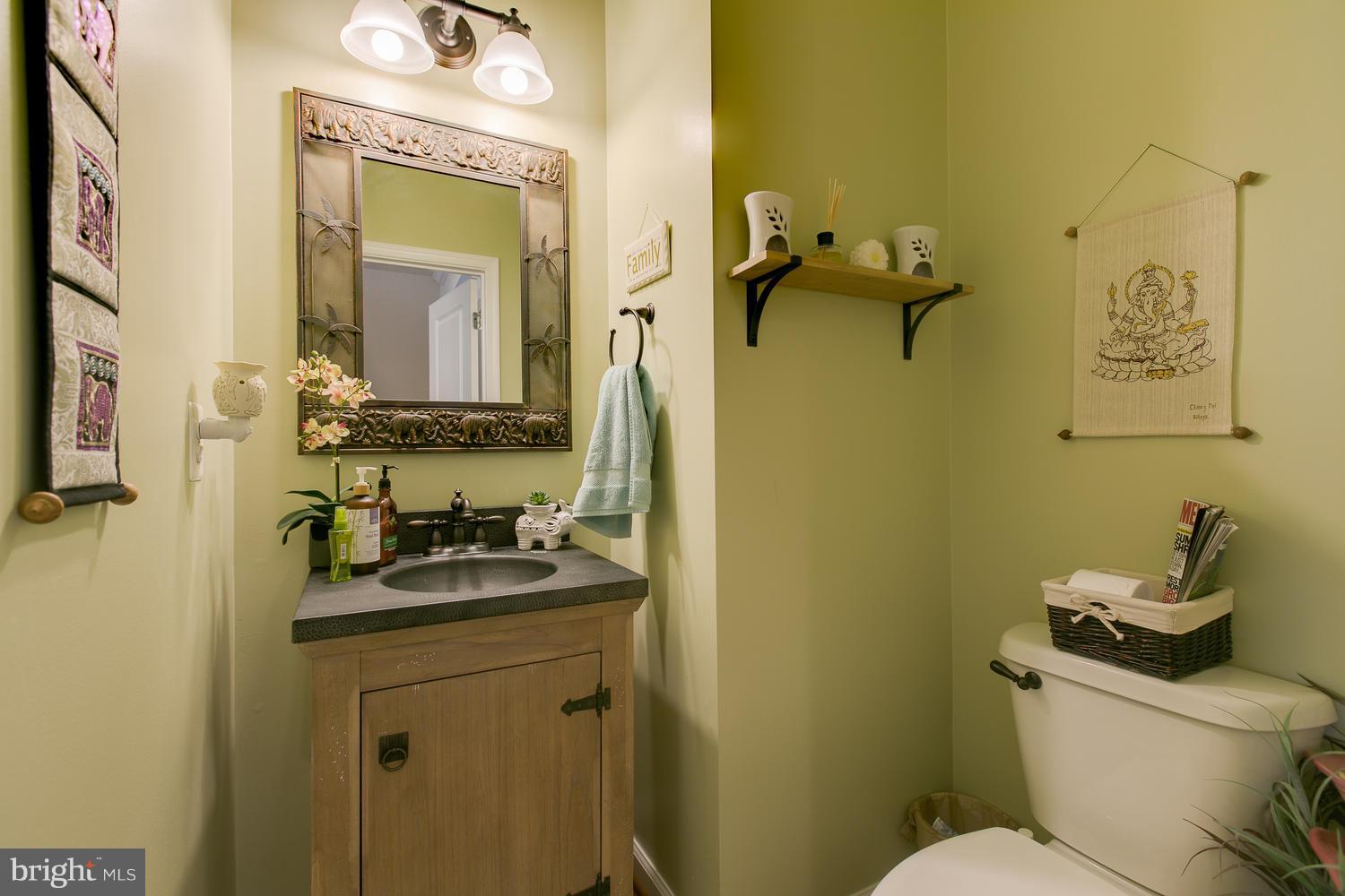42 Short Branch Road Stafford, VA 22556 - Photo 15 of 26 a bathroom with a granite countertop sink mirror vanity and toilet