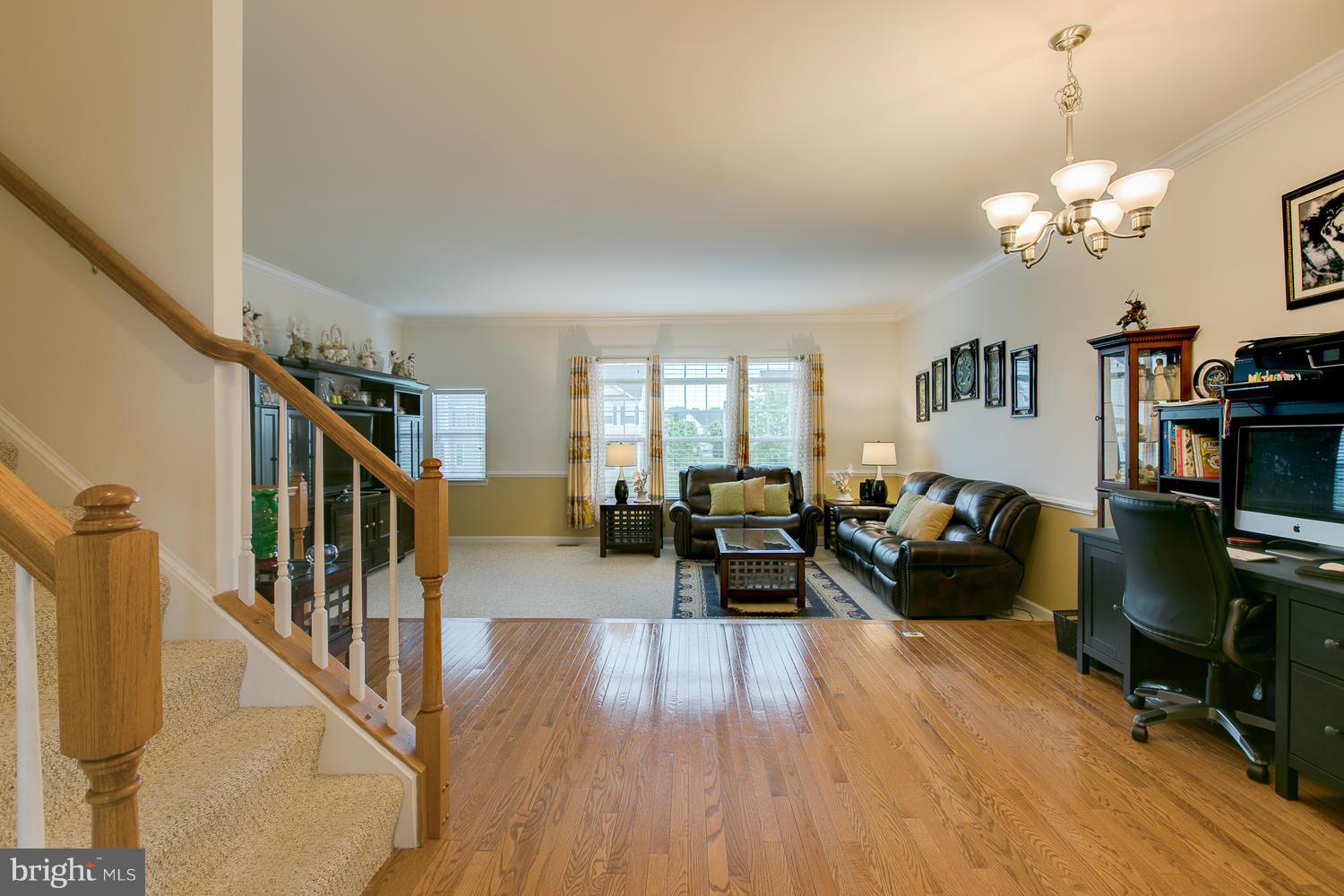 42 Short Branch Road Stafford, VA 22556 - Photo 8 of 26 a living room with fireplace furniture and a wooden floor