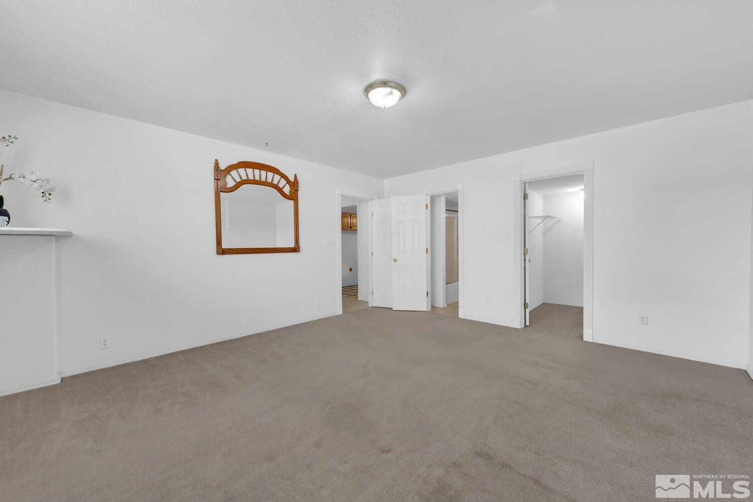 1031 University Ridge Drive Reno, NV 89512 - Photo 28 of 38 a view of an empty room with a window