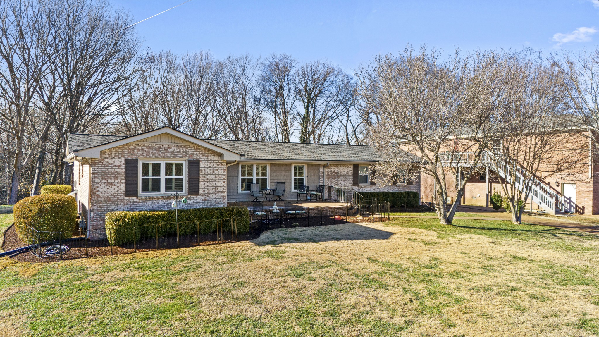 243 Green Harbor Road Old Hickory, TN 37138 - Photo 42 of 48 a front view of a house with a yard covered in snow