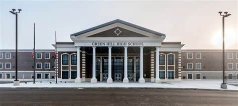 243 Green Harbor Road Old Hickory, TN 37138 - Photo 46 of 48 a view of a brick house with large windows and a small yard
