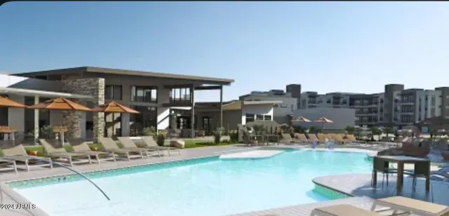 a view of a house with backyard and porch