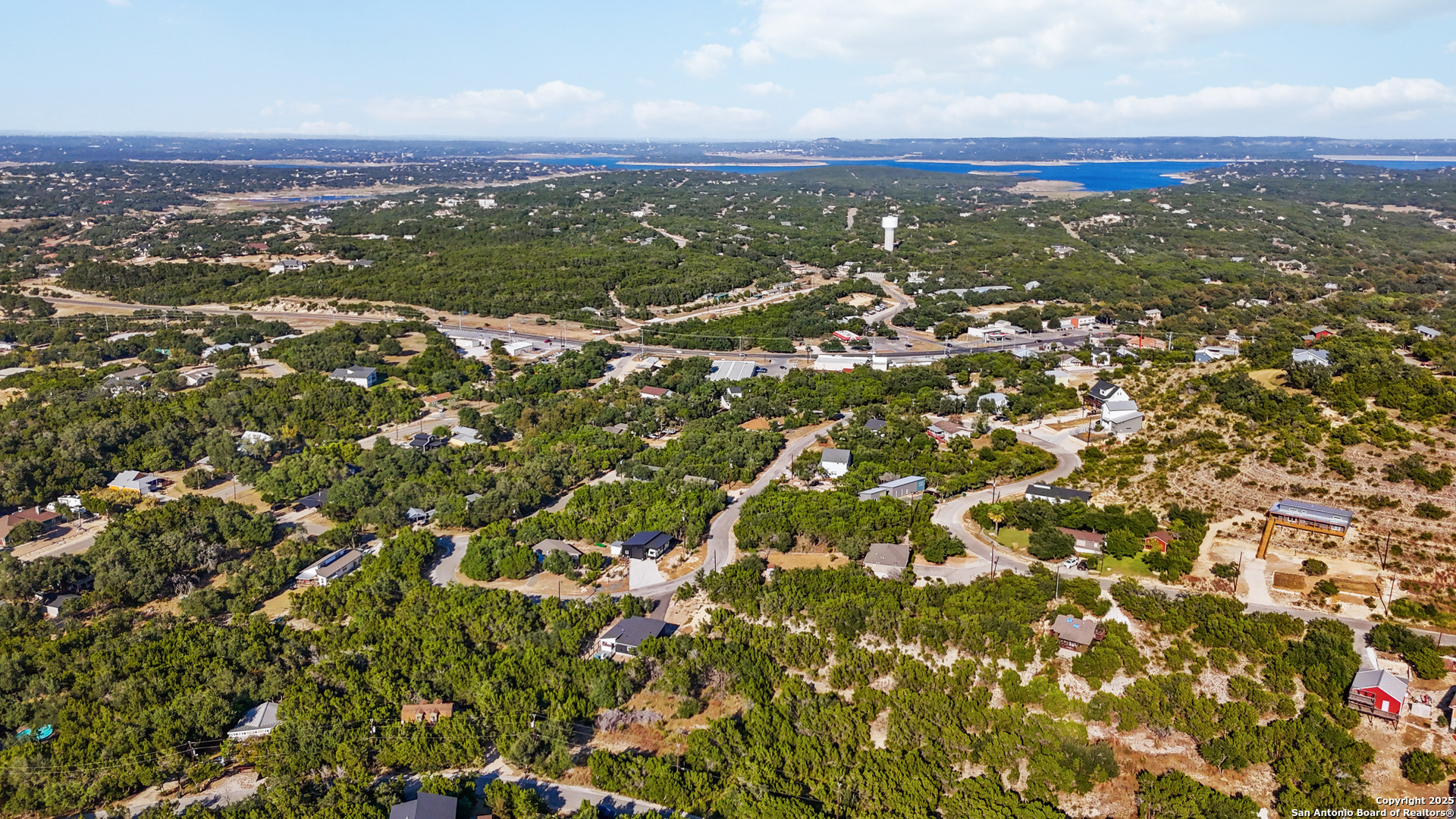 823 Valley Ridge Canyon Lake, TX 78133 - Photo 3 of 18 an aerial view of residential houses with city view
