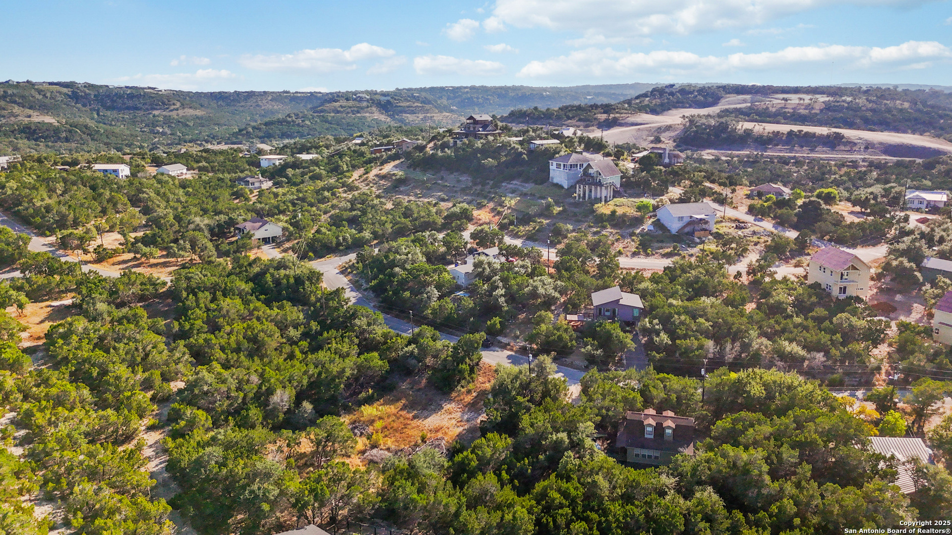 823 Valley Ridge Canyon Lake, TX 78133 - Photo 7 of 18 an aerial view of residential houses with outdoor space and trees