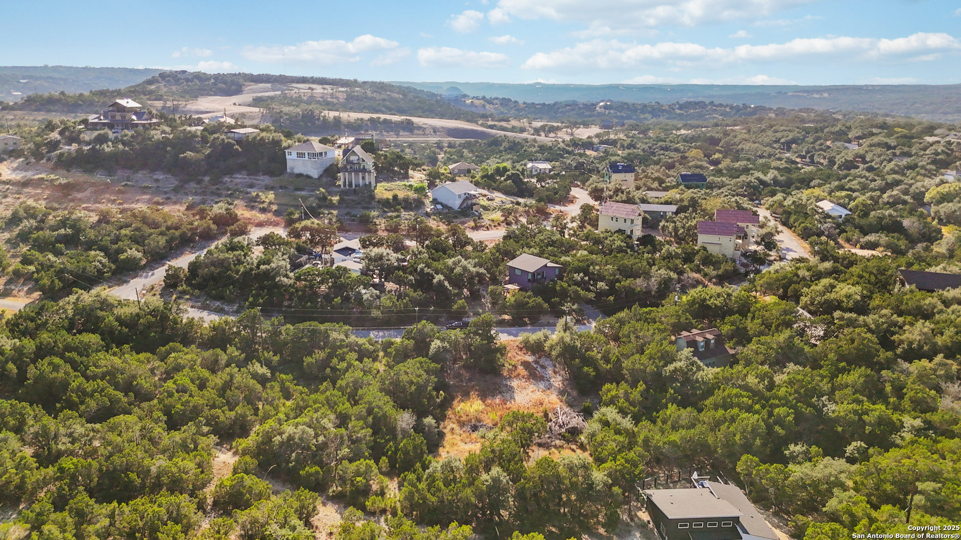 823 Valley Ridge Canyon Lake, TX 78133 - Photo 8 of 18 an aerial view of residential houses with city view