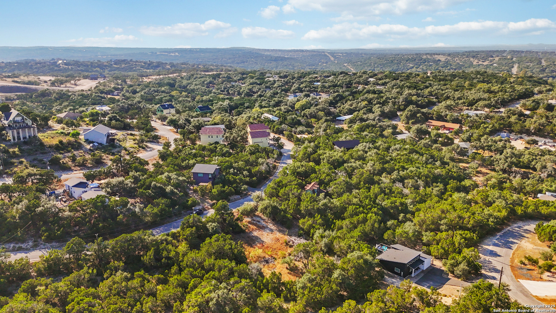 823 Valley Ridge Canyon Lake, TX 78133 - Photo 9 of 18 an aerial view of multiple house