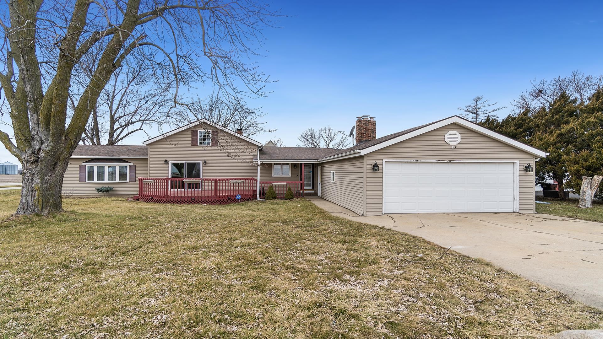 8446 South Main Street Rochelle, IL 61068 - Photo 1 of 29 a view of a house with wooden fence