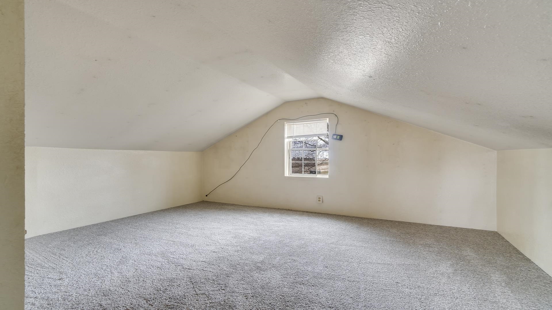 8446 South Main Street Rochelle, IL 61068 - Photo 22 of 29 an empty room with a empty space and windows
