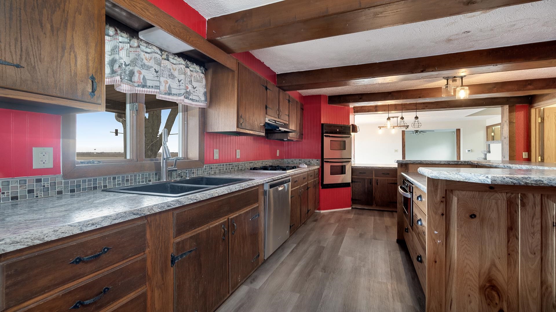 8446 South Main Street Rochelle, IL 61068 - Photo 9 of 29 a kitchen with stainless steel appliances granite countertop a sink stove and cabinets