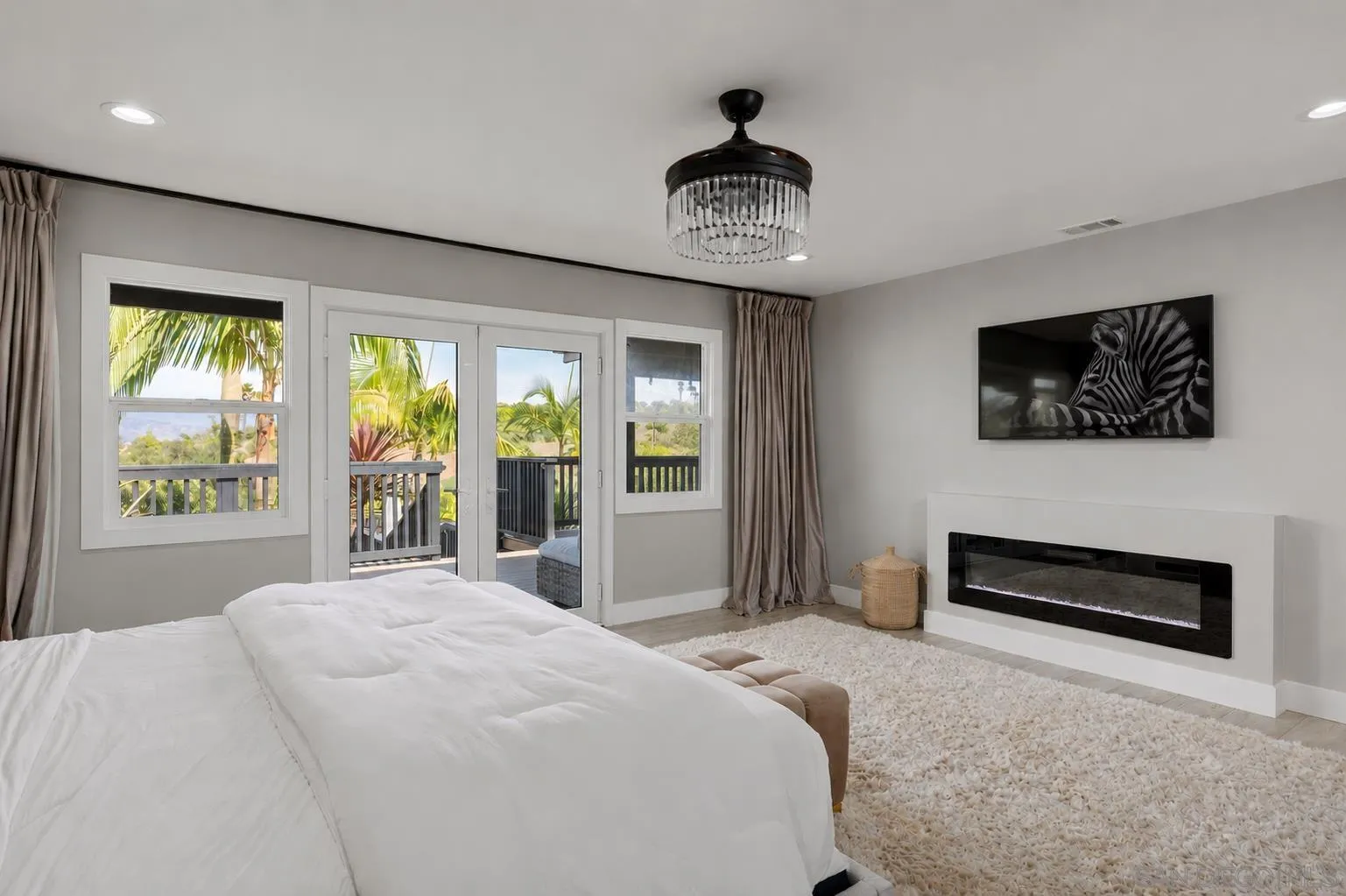 521 Rancho Camino Fallbrook, CA 92028 - Photo 27 of 72 a bedroom with a bed and a flat screen tv