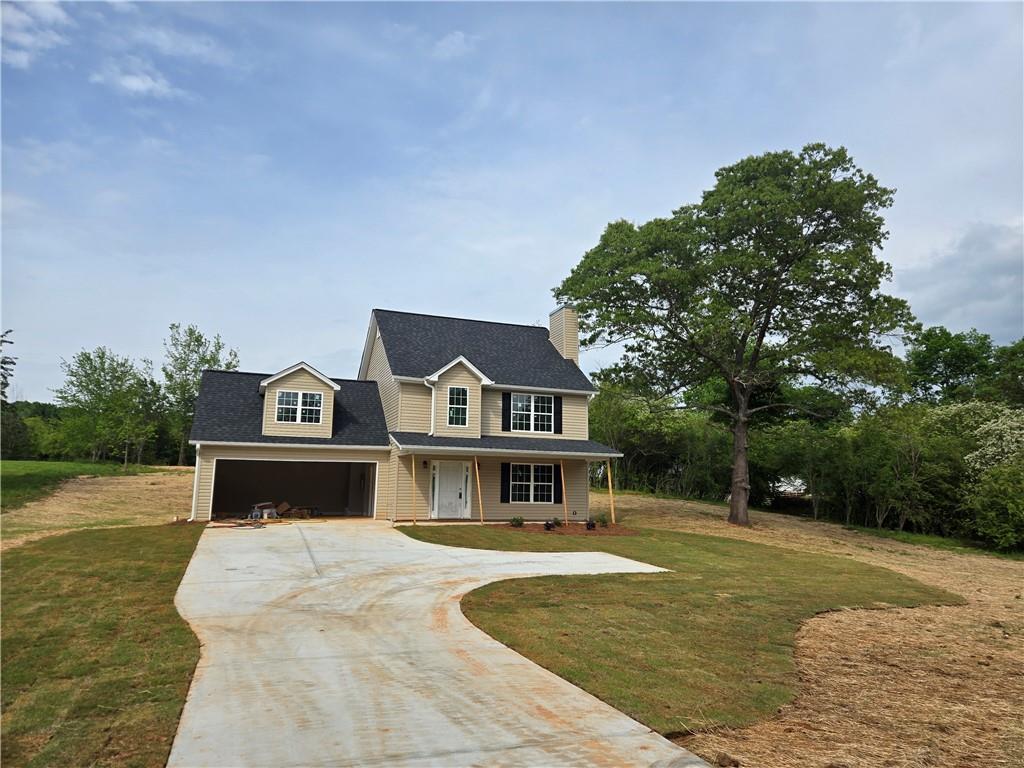 91 Quail Vw Ridge Cleveland, GA 30528 - Photo 1 of 1 a front view of a house with a yard