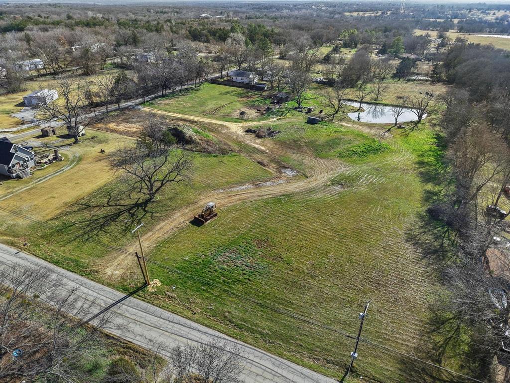 Tbd East Texas Street Denison, TX 75021 - Photo 1 of 31 an aerial view of residential houses with outdoor space