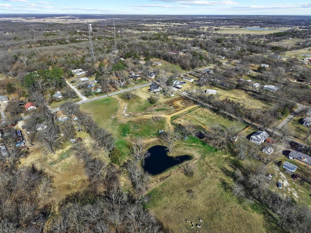 Tbd East Texas Street Denison, TX 75021 - Photo 20 of 31 an aerial view of residential houses with outdoor space