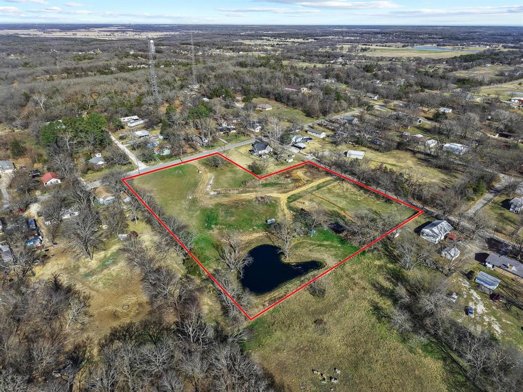 Tbd East Texas Street Denison, TX 75021 - Photo 22 of 31 an aerial view of a house with a yard