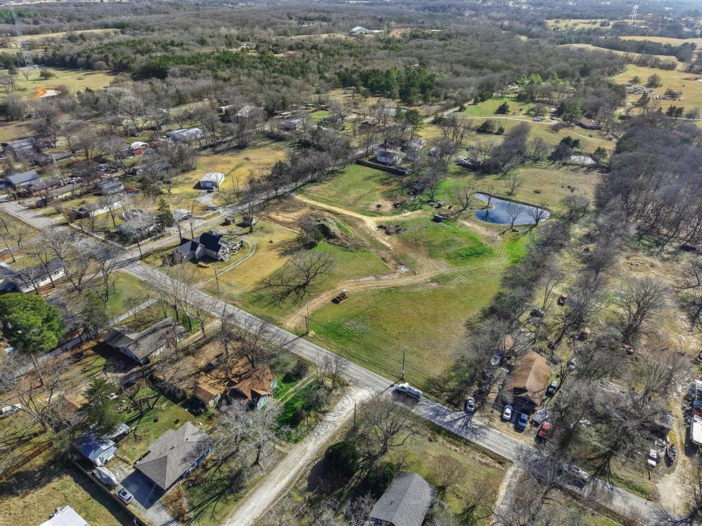 Tbd East Texas Street Denison, TX 75021 - Photo 23 of 31 an aerial view of residential houses with outdoor space