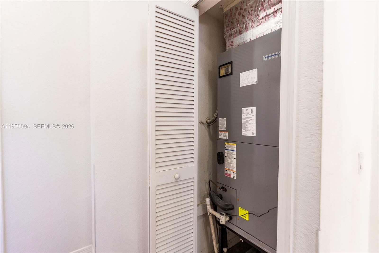 12478 Southwest 123rd Street Miami, FL 33186 - Photo 19 of 34 a view of a hallway