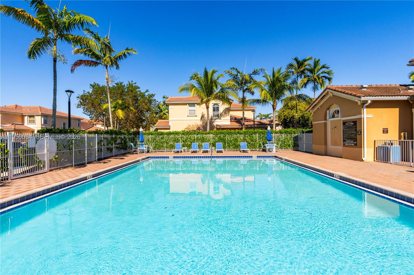 12478 Southwest 123rd Street Miami, FL 33186 - Photo 29 of 34 a swimming pool view with a garden space