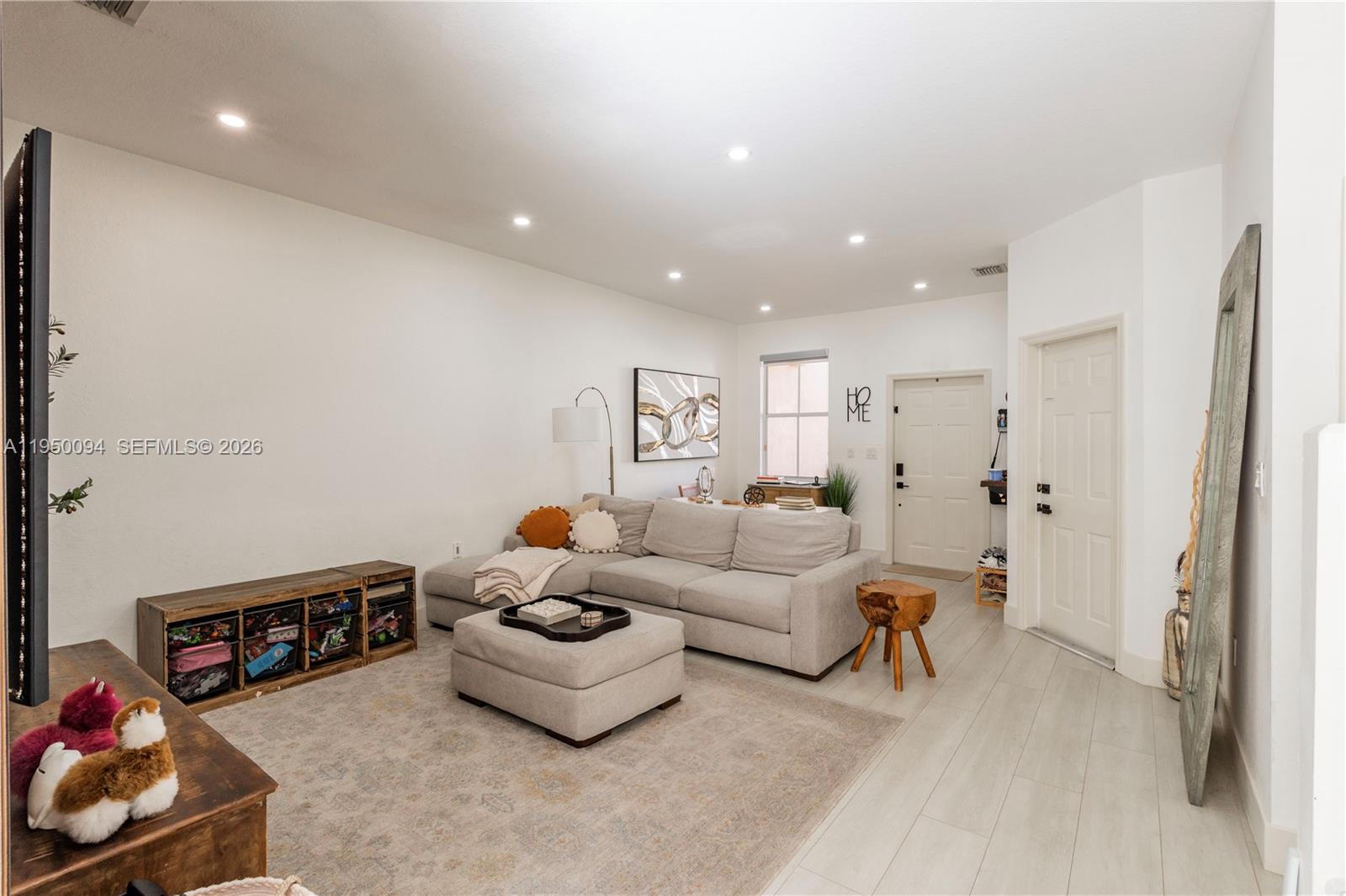 12478 Southwest 123rd Street Miami, FL 33186 - Photo 8 of 34 a living room with furniture and a couch