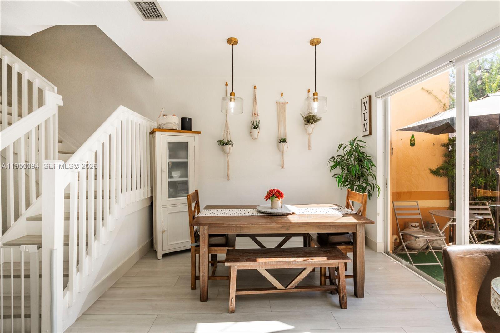 12478 Southwest 123rd Street Miami, FL 33186 - Photo 9 of 34 a dining room with furniture and window