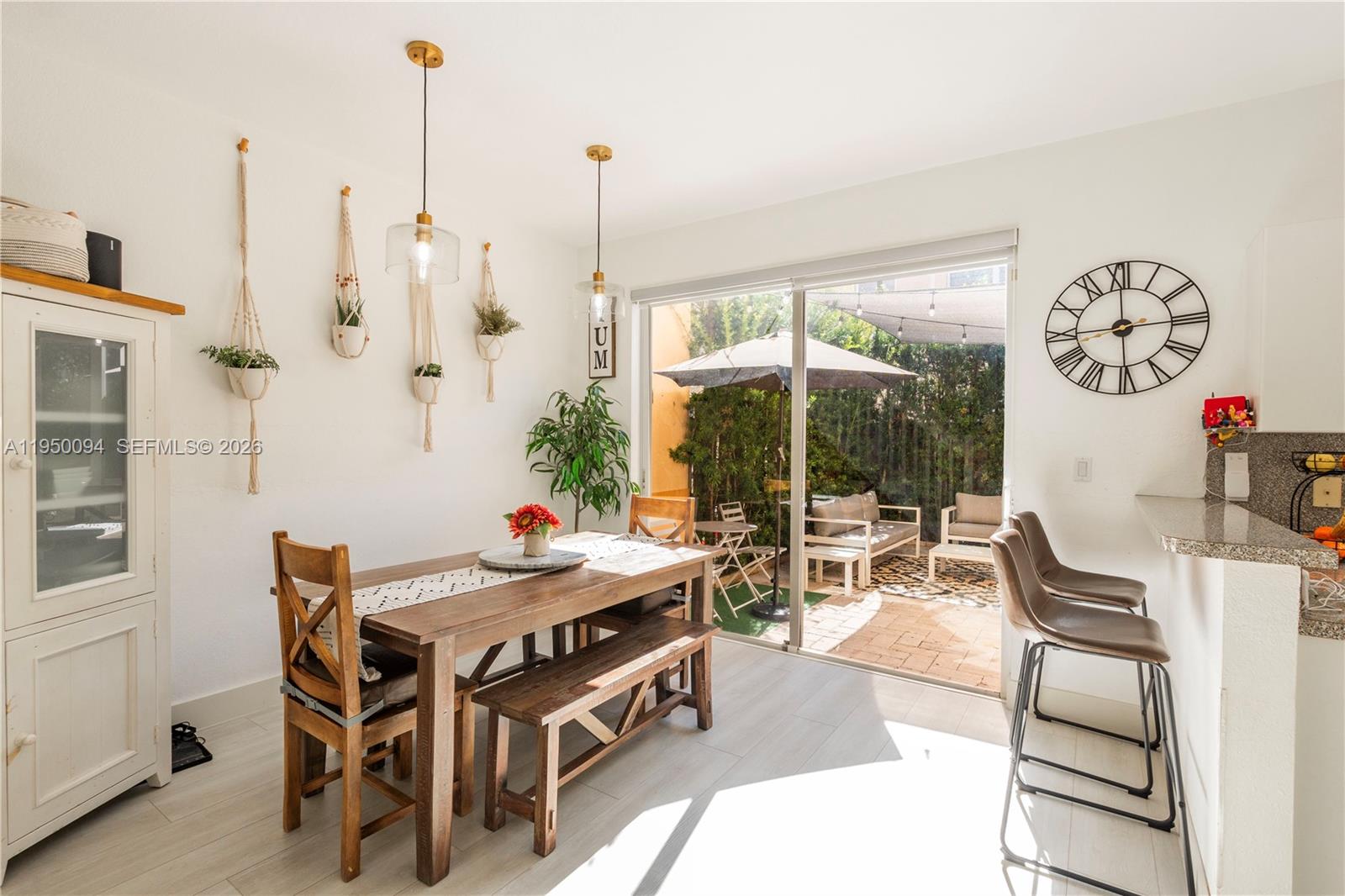 12478 Southwest 123rd Street Miami, FL 33186 - Photo 10 of 34 a view of a dining room with furniture window and outside view