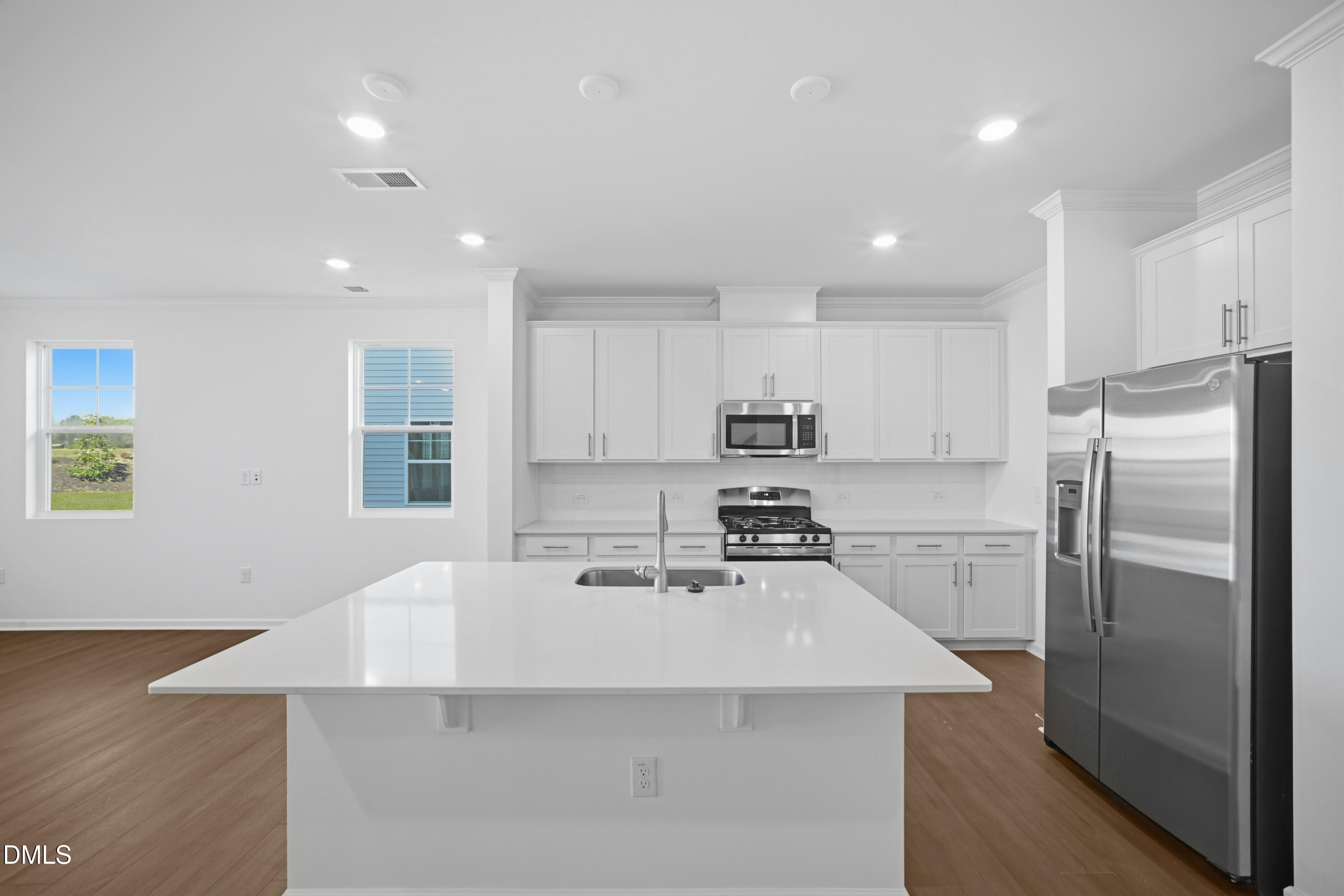 2921 Hickory Fld Drive Raleigh, NC 27616 - Photo 8 of 30 a kitchen with stainless steel appliances a refrigerator sink and microwave