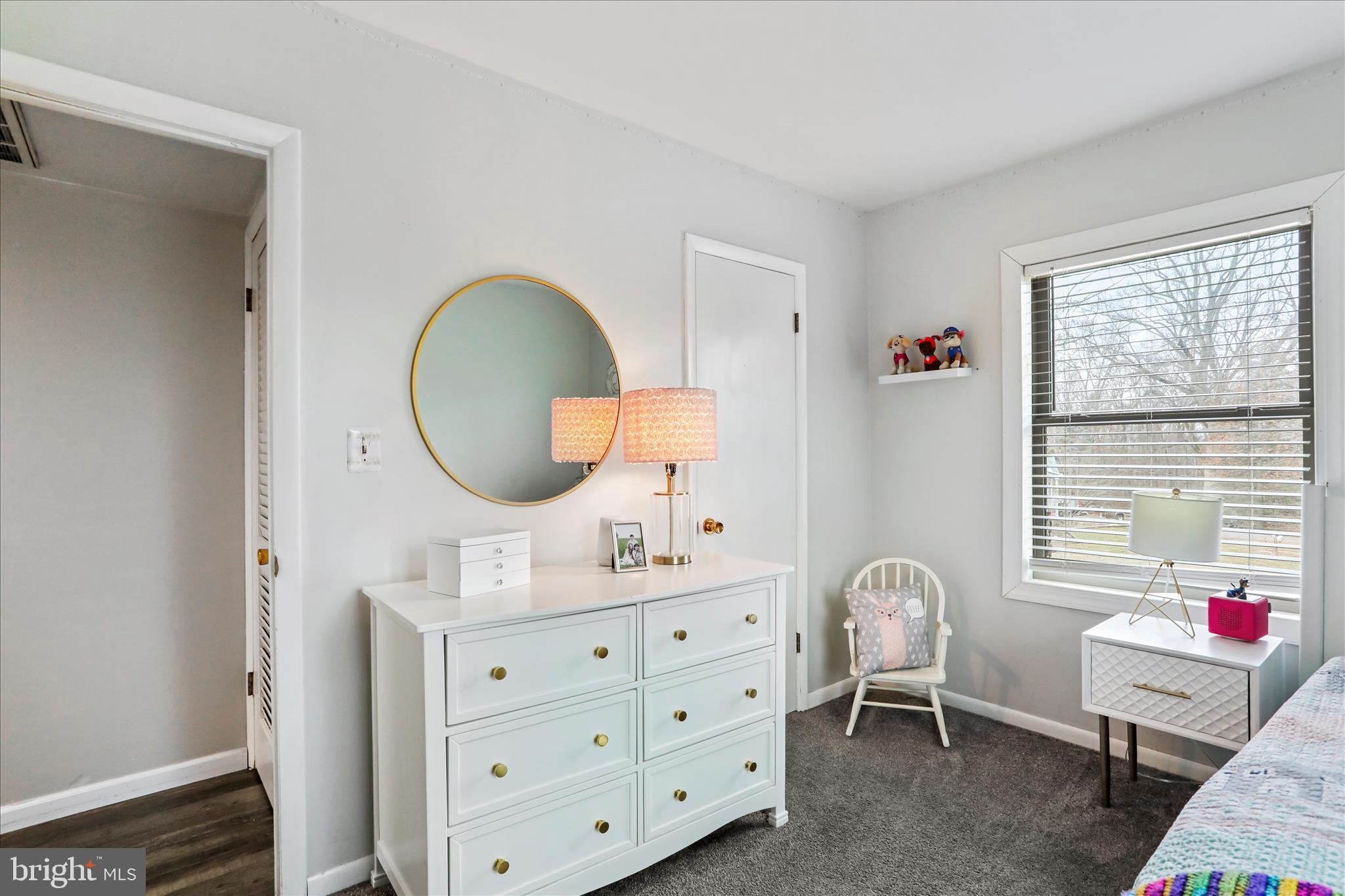 7879 Talhelm Road Chambersburg, PA 17202 - Photo 11 of 43 a living room with furniture and a window