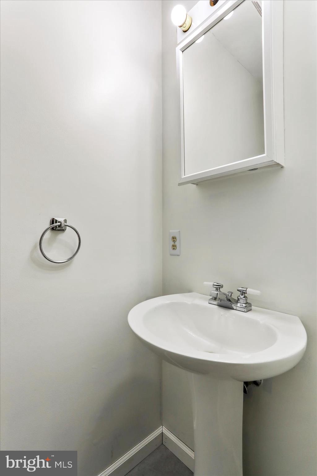 7879 Talhelm Road Chambersburg, PA 17202 - Photo 15 of 43 a bathroom with a sink and a mirror