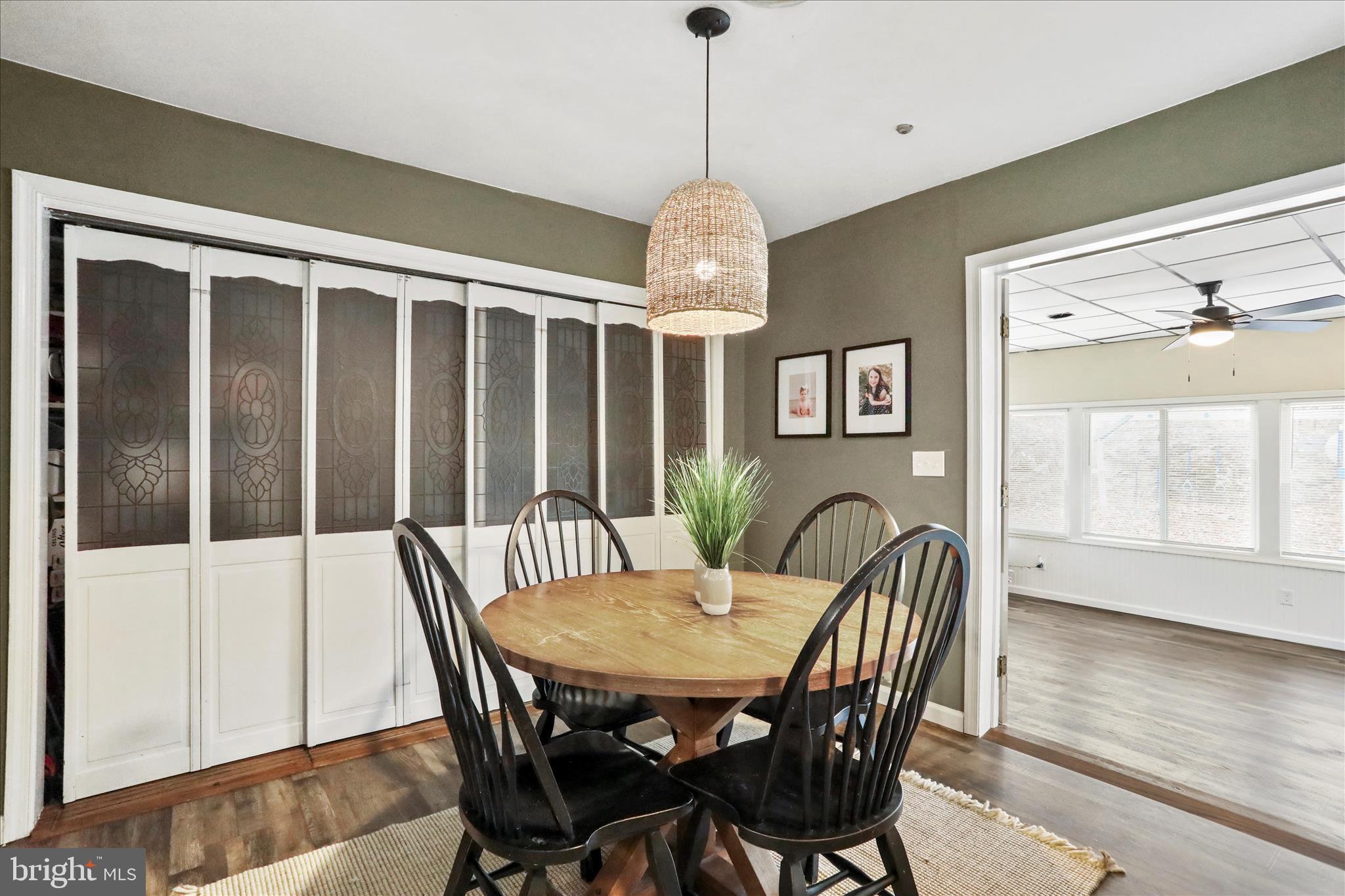 7879 Talhelm Road Chambersburg, PA 17202 - Photo 20 of 43 a view of a dining room with furniture window and wooden floor