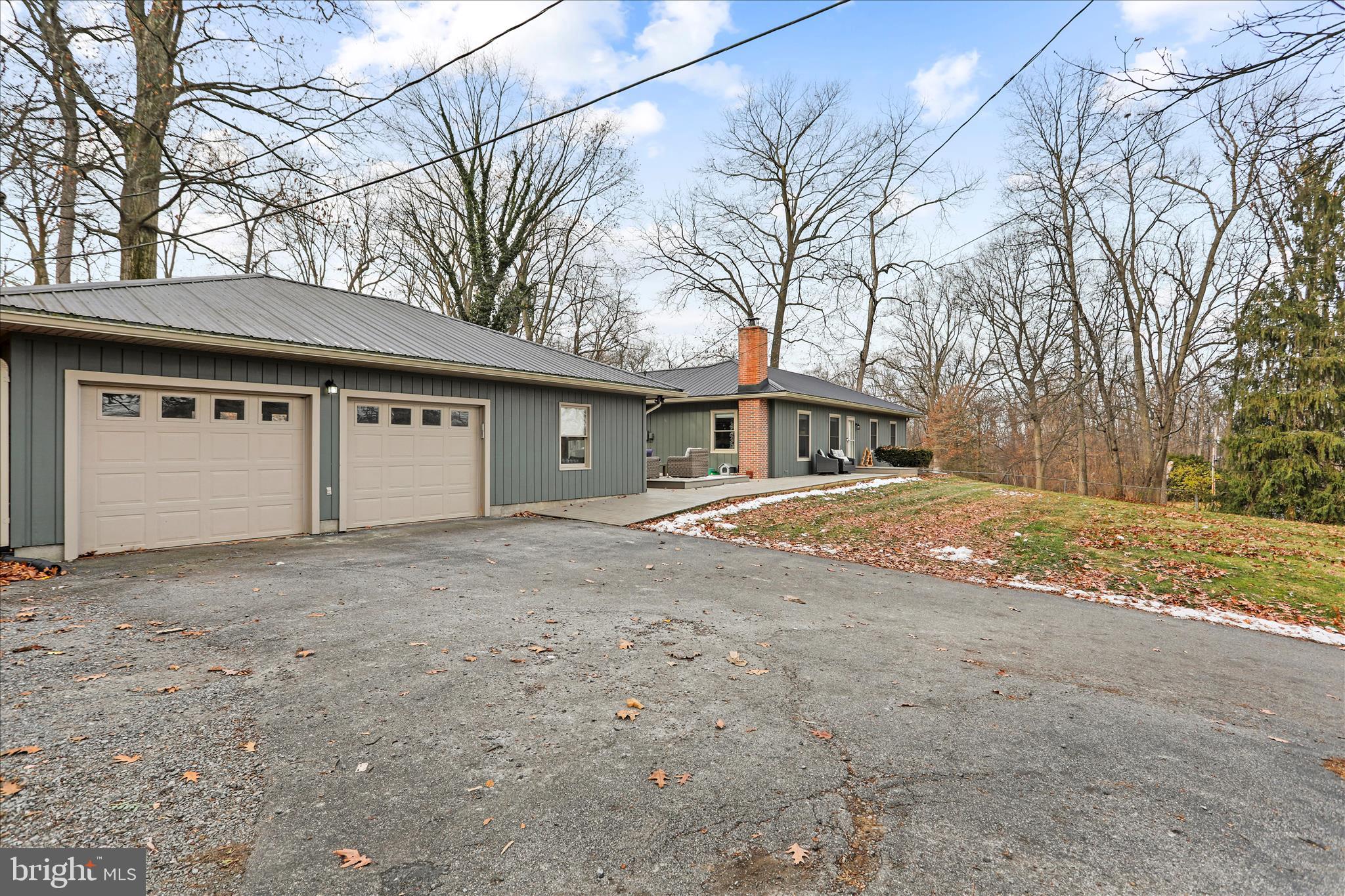 7879 Talhelm Road Chambersburg, PA 17202 - Photo 2 of 43 a view of a house with a yard and garage