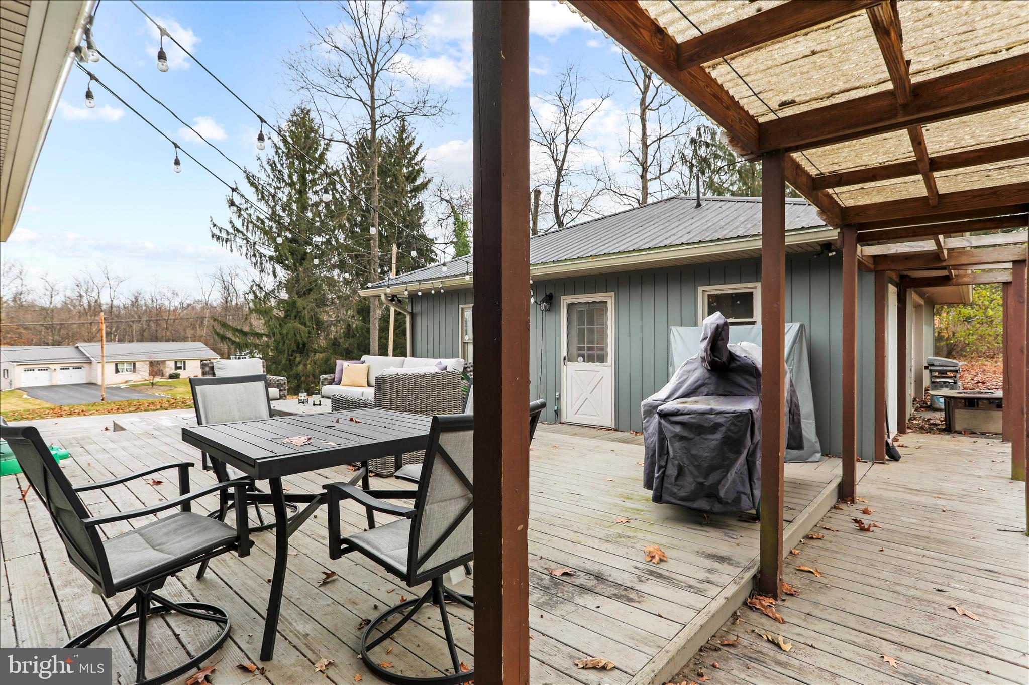 7879 Talhelm Road Chambersburg, PA 17202 - Photo 28 of 43 a view of a outdoor space with seating area