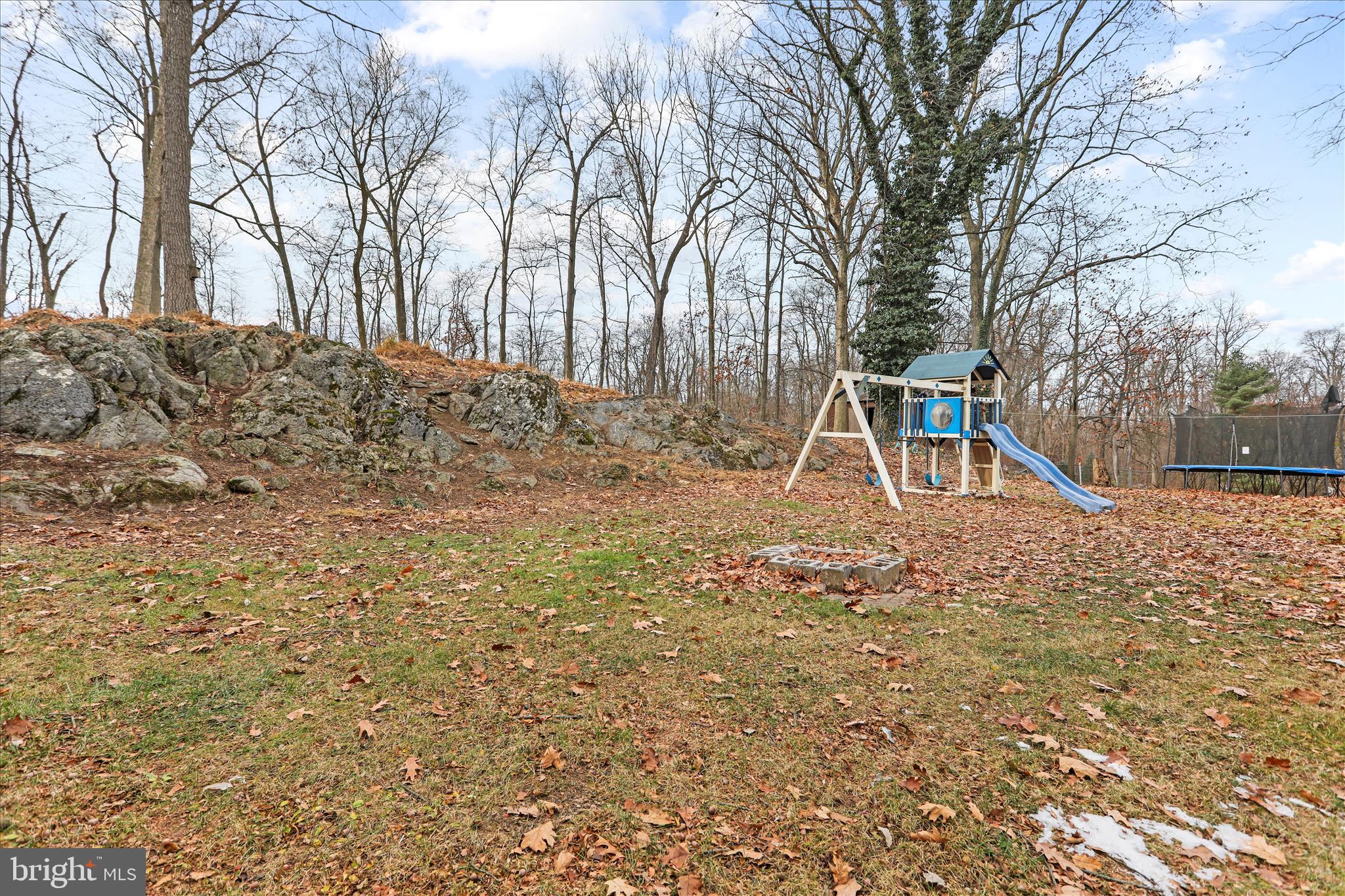 7879 Talhelm Road Chambersburg, PA 17202 - Photo 34 of 43 a backyard of a house with table and chairs