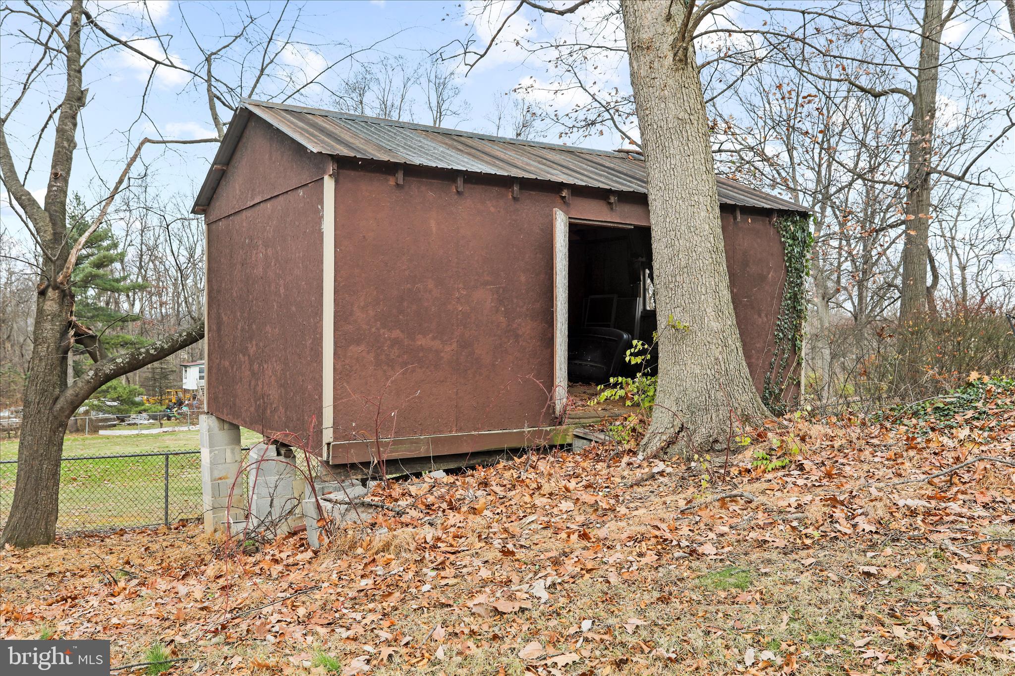 7879 Talhelm Road Chambersburg, PA 17202 - Photo 37 of 43 a view of a house with a yard
