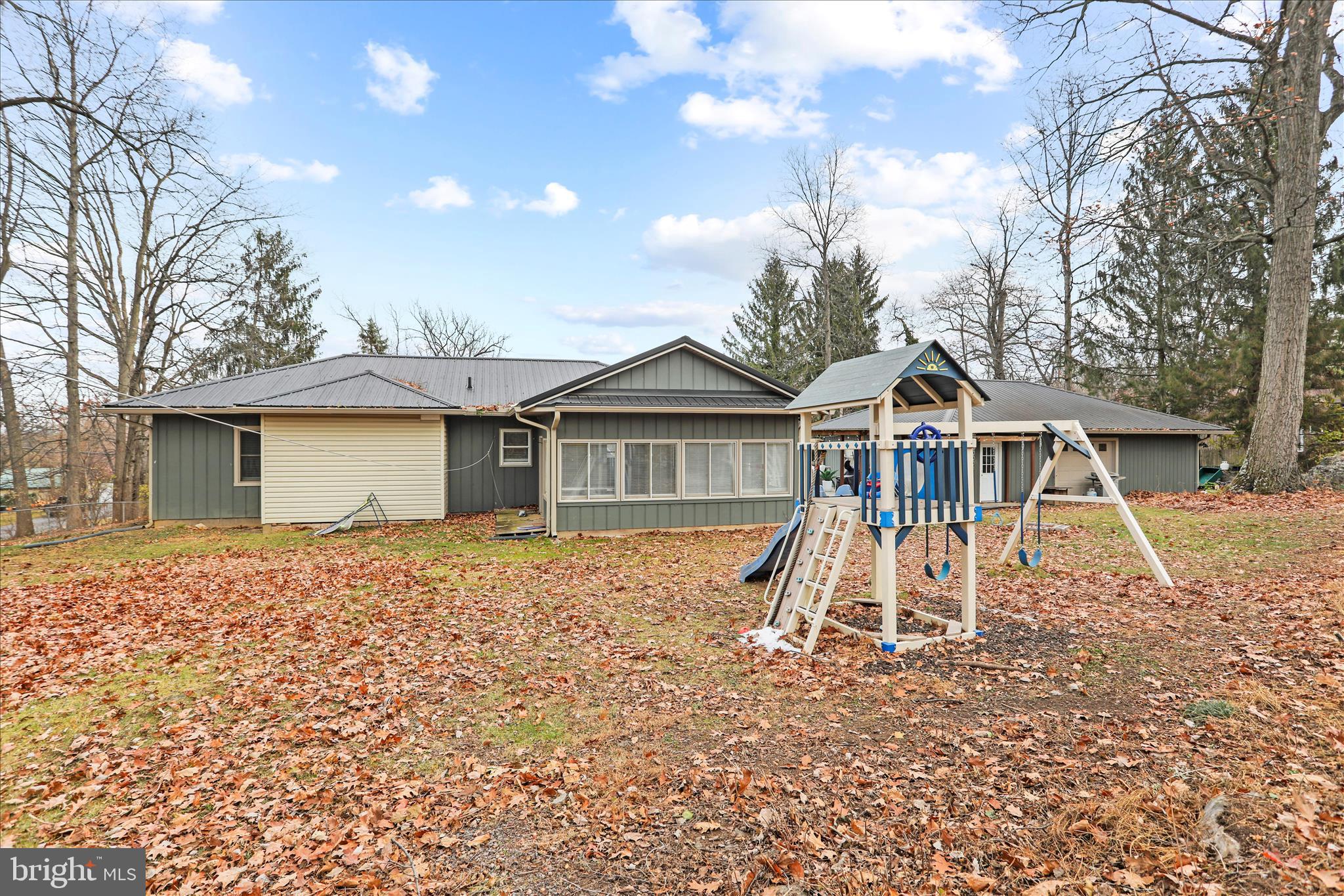 7879 Talhelm Road Chambersburg, PA 17202 - Photo 38 of 43 a front view of a house with a yard