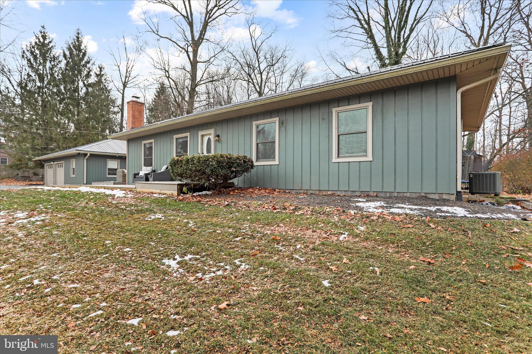 7879 Talhelm Road Chambersburg, PA 17202 - Photo 41 of 43 a backyard of a house with yard and outdoor seating