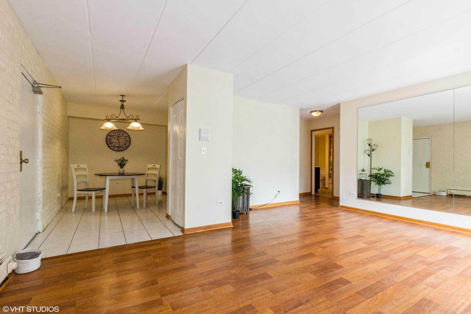 118 East Bailey Road, Unit D Naperville, IL 60565 - Photo 4 of 15 a view of an entryway with wooden floor and a livingroom view