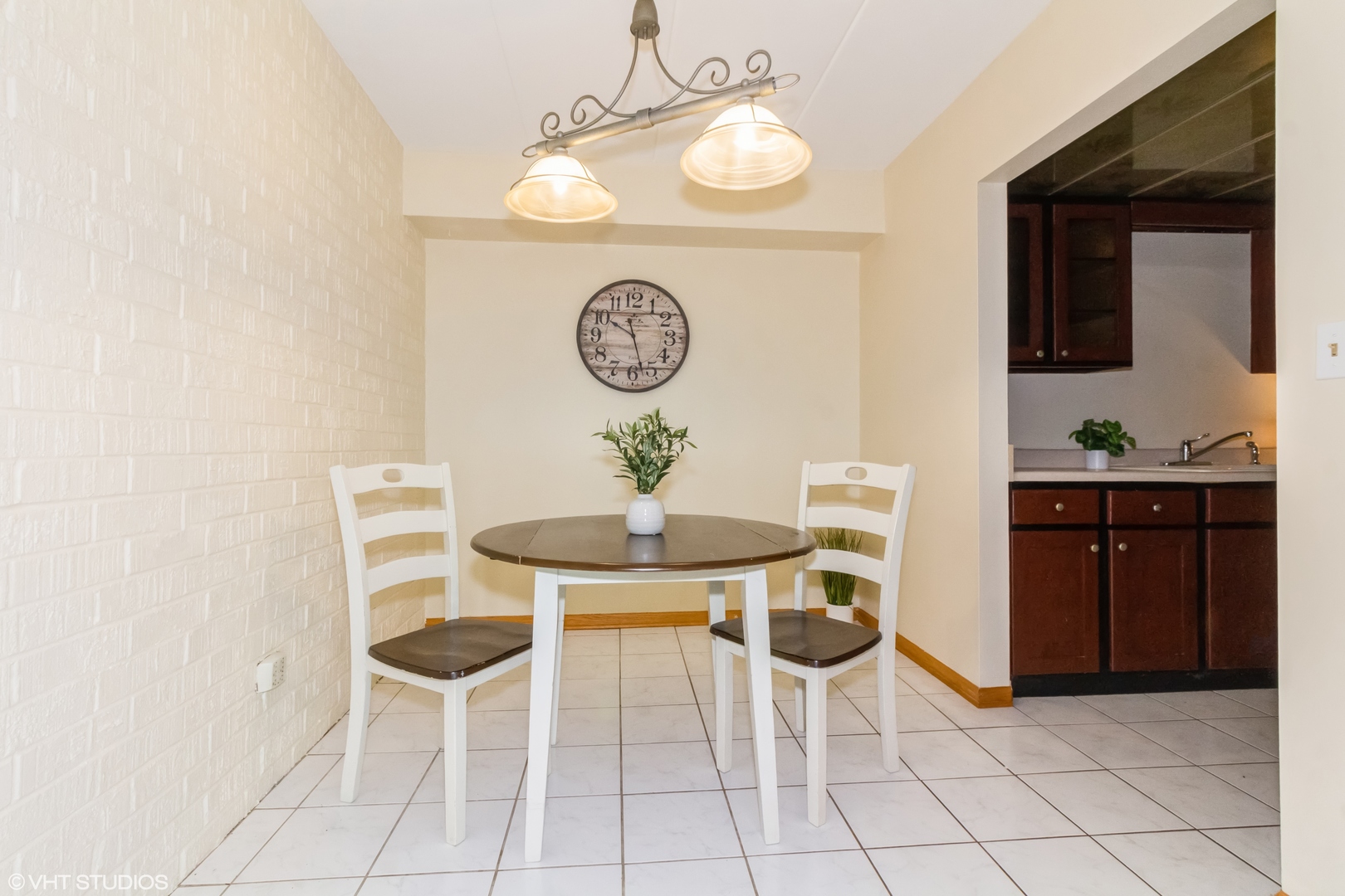 118 East Bailey Road, Unit D Naperville, IL 60565 - Photo 6 of 15 a view of a kitchen with a table and chairs