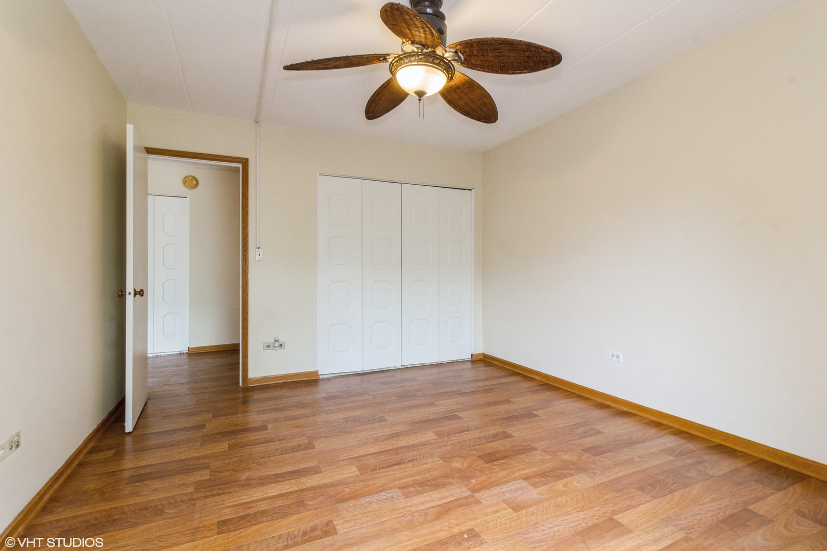 118 East Bailey Road, Unit D Naperville, IL 60565 - Photo 9 of 15 a view of an empty room with wooden floor