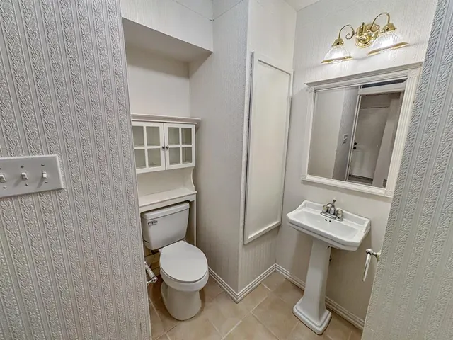 a view of storage and utility room with washer and dryer