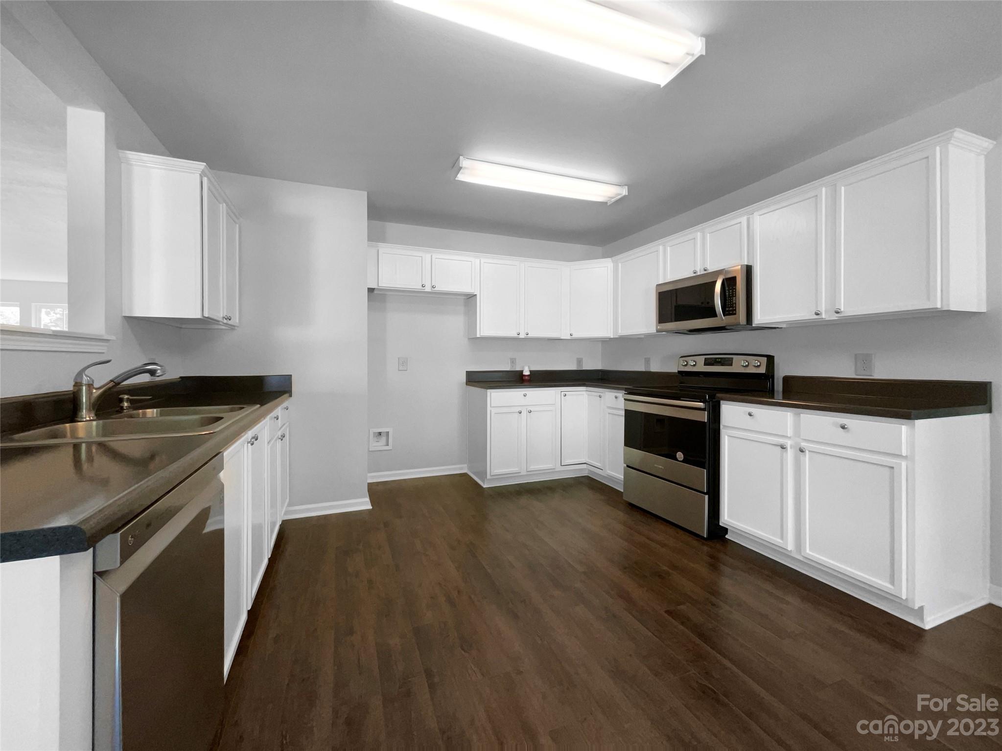 2098 Durand Road Fort Mill, SC 29715 - Photo 9 of 21 a kitchen with a sink stove top oven and refrigerator