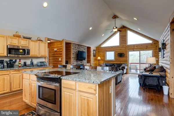 a view of a balcony with wooden floor