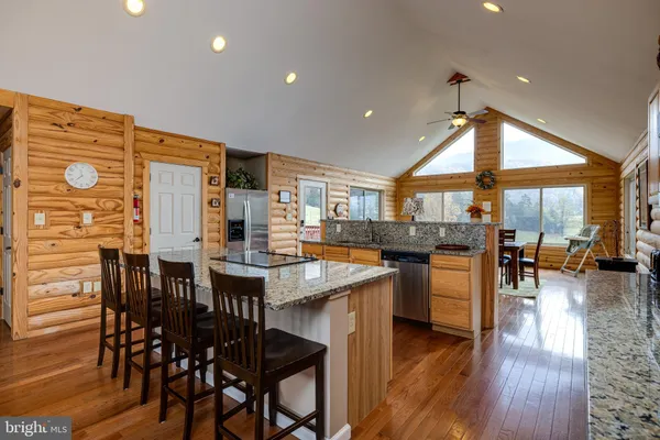 a bedroom with a bed and a potted plant